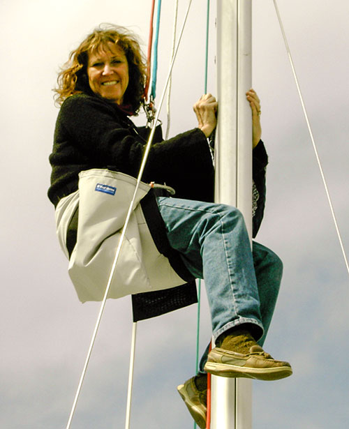 Chloe on ship's mast
